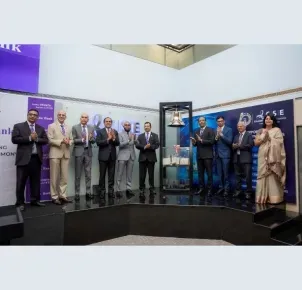 Amãna Bank Commemorates 15-Year Milestone by Ringing Market Opening Bell
